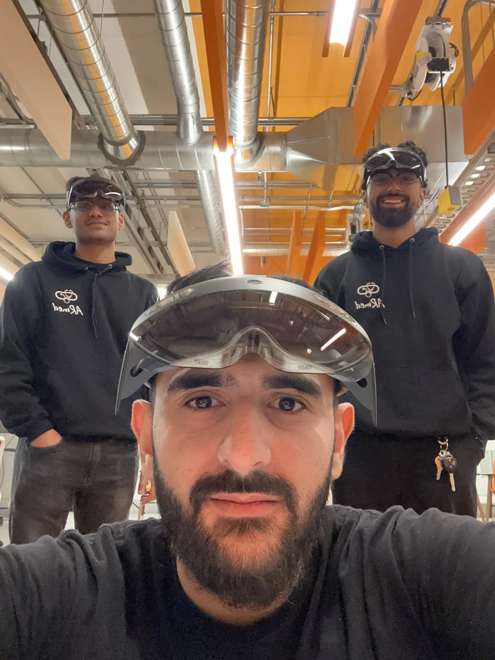ARmed student group working with NeuroPawn hardware